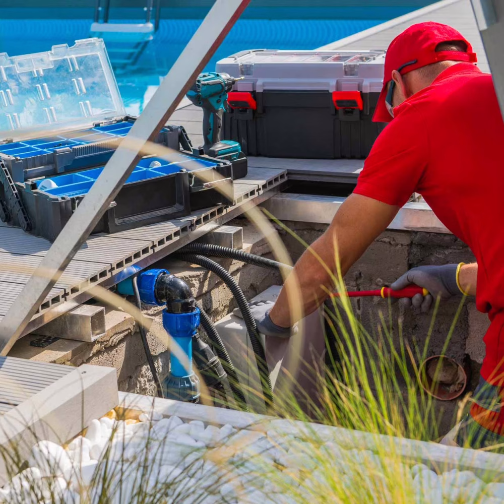 technician-fixing-swimming-pool-heating-system-2023-11-27-04-58-22-utc.jpg